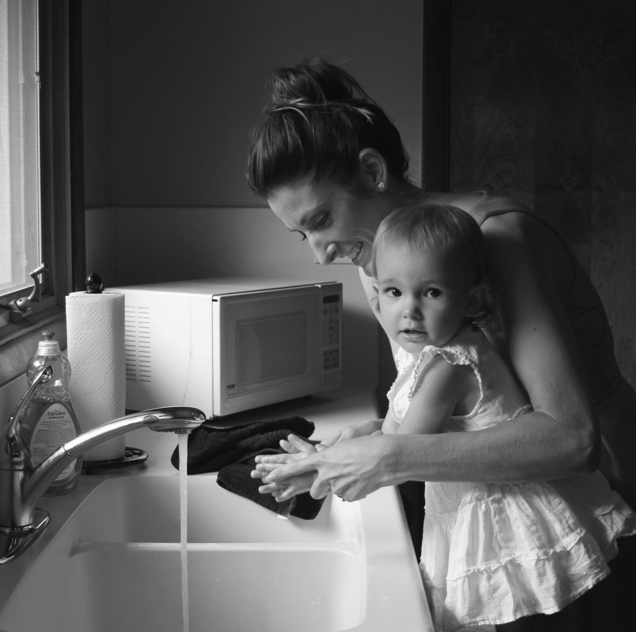 adult-baby-black-and-white-1089077-crop mother and child home town